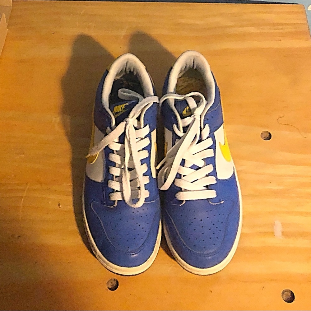Blue and yellow Nike sneakers